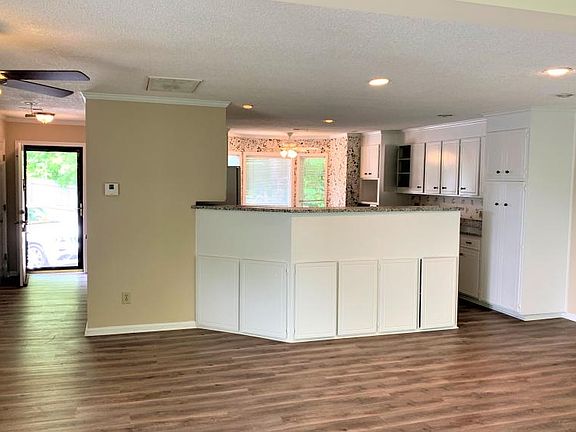 Front door, 1/2bath, kitchen