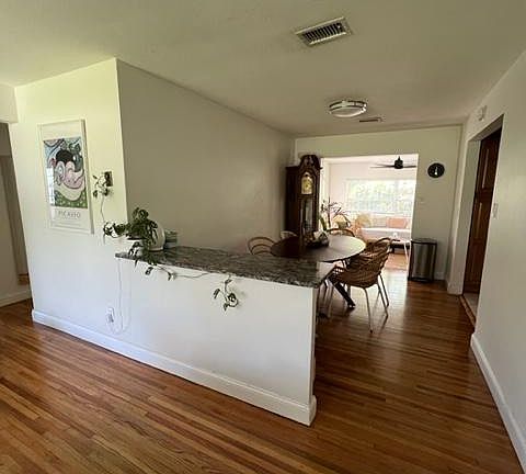 Refinished original hard wood floors. Marble counter- great for entertaining.