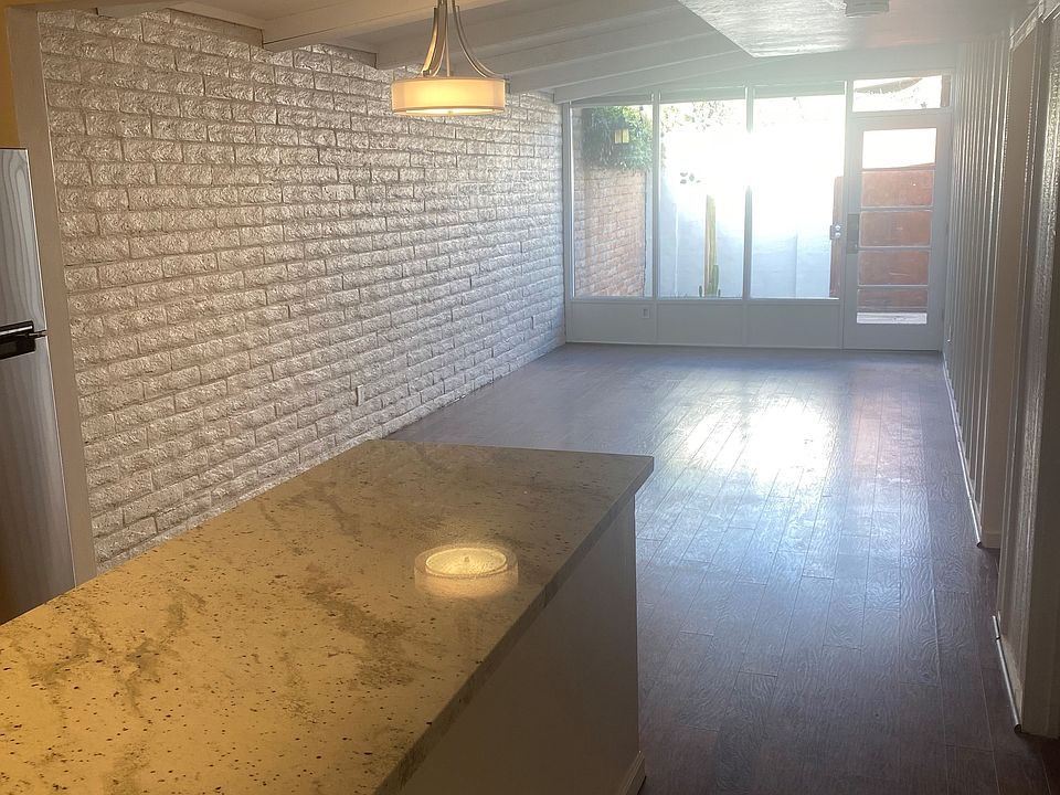Kitchen view to dining and living room.