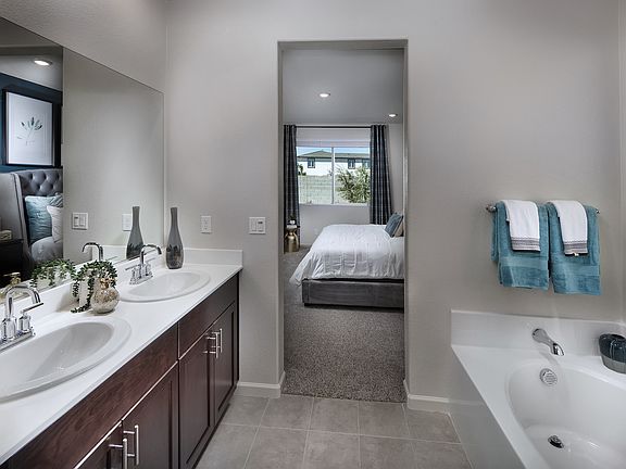 Residence 2 primary bathroom modeled at a nearby Meritage community.