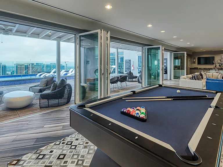 Club room with gaming area and outdoor seating