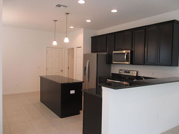 4th image of 6971 Tussilago Way