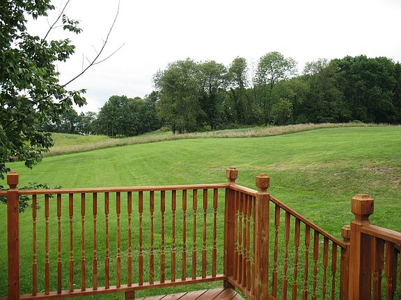 Deck adds more to the living space o the home, and overlooks the large yard