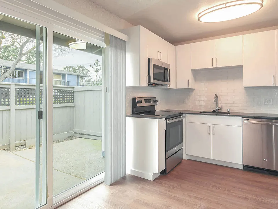 Kitchen with Stainless Steel Appliances and Private Patio