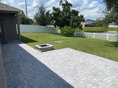 Paver deck outside of screened patio
