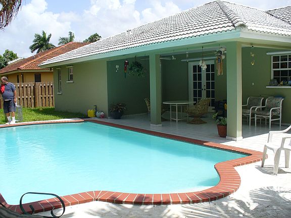 Covered Terrace, w/pool bathroom/wood privacy fence