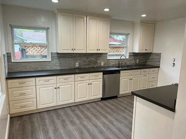 All new floor, cabinets, counter, appliances