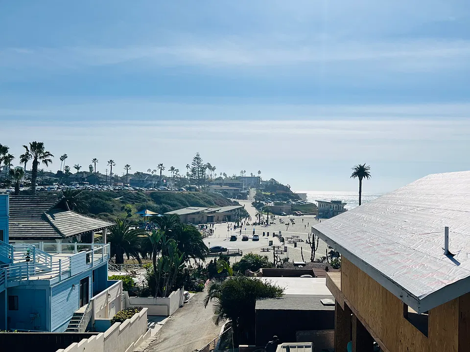 View of Moonlight Beach from private deck.