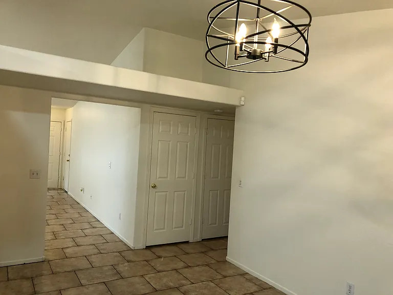 View of dining area with pot shelves