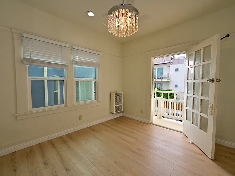 FULLY UPGRADED Studio + private balcony with Ocean view, New flooring, almost new everything, with in-unit laundry!