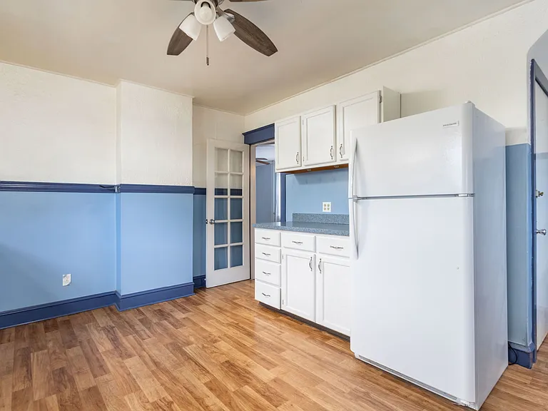 View towards dining room.
Door to basement with direct access to laundry in basement.