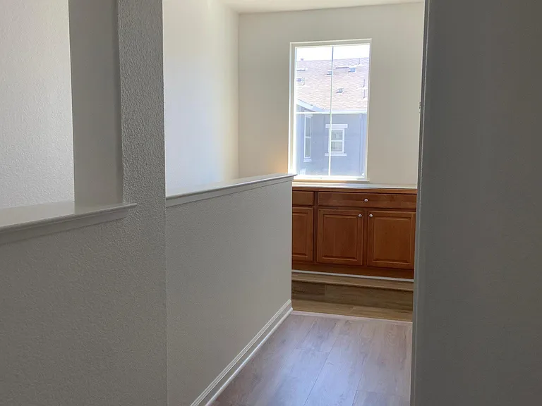 Bright hallway with additional storage.
