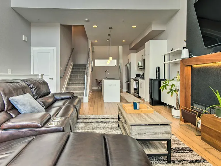 Living area and kitchen in the background