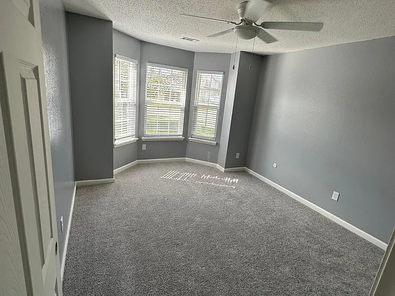 Bedroom with bay windows