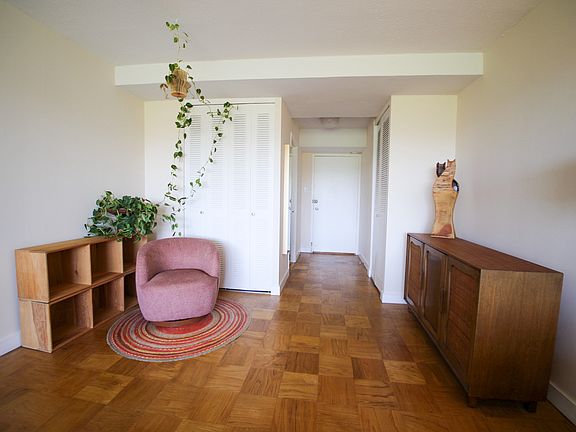 Apartment entry way and lounge nook (large enough to also be a dining area)