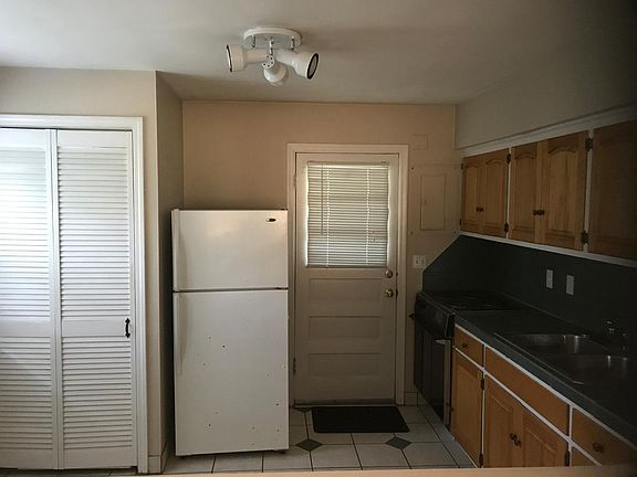 Kitchen with W/D in closet - room for table