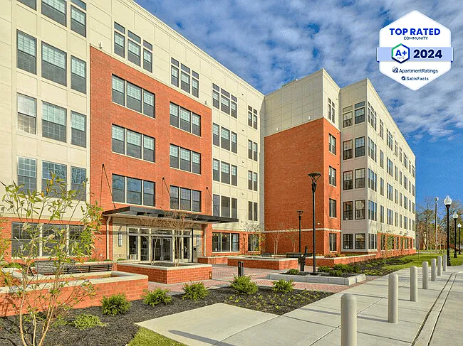 Ingram Manor Apartments Encore Exterior Daylight Image with Top Rated Community Logo
