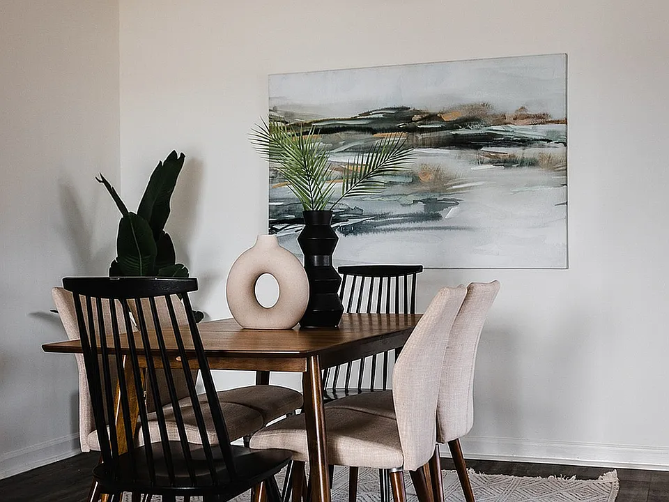 Dining area with hardwood-style flooring
