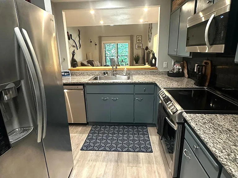 looking from bonus room/office into kitchen
