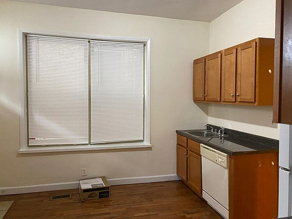 2nd image of 1123 W 31st St #1REAR