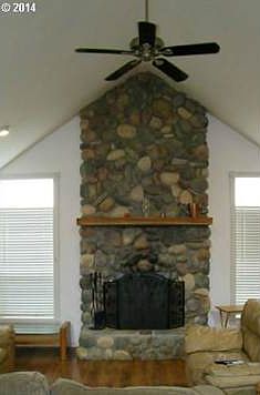 Floor to Ceiling woodburning fireplace