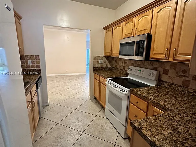 2988 NW 7th Ct — Photo 5
