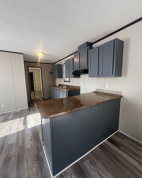 1st image of 534 E 37th Ave Lot 165