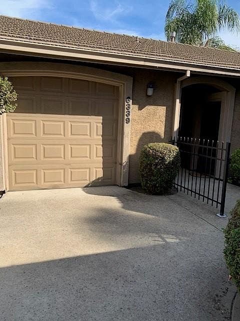 front door and one car garage