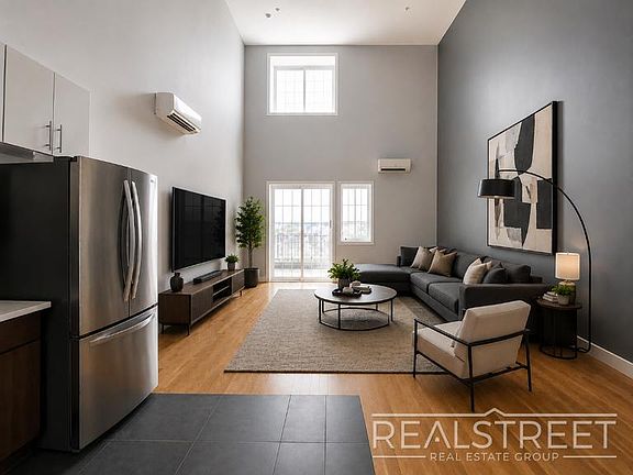 2nd image of 90-02 Queens Blvd #Penthouse 3