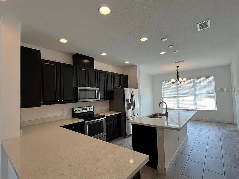 6561 Calamondin Dr — Photo 7