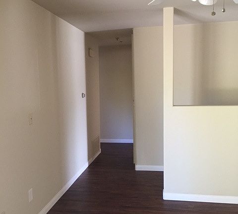 Dining area into hallway to bedrooms