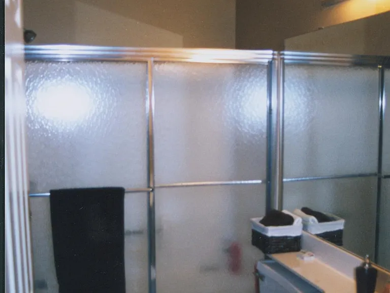 Roomy closet next to bathroom