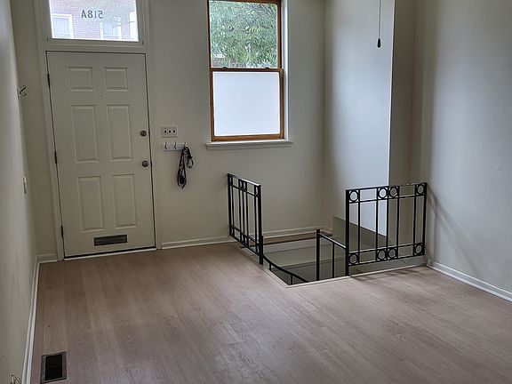 Living Room view towards street and entry