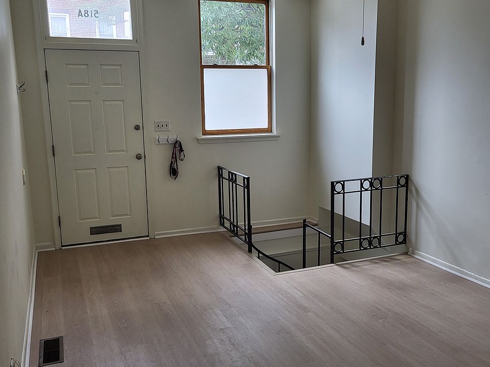 Living Room view towards street and entry