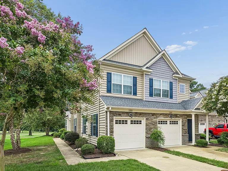 End unit with lots of light and attached garage