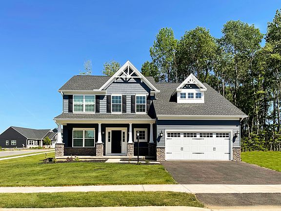 The Newport C - S A Homes - exterior view - 2 story home with partial stone front and large porch, a