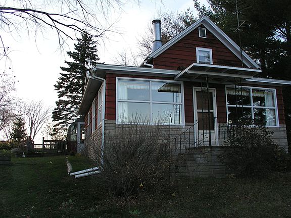 Heated greenhouse on left