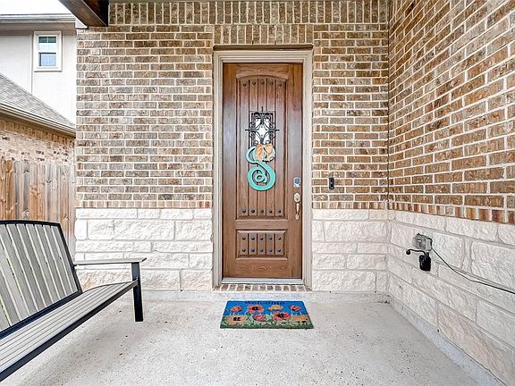 Come on in and let the memories begin! Beautiful Lennar home with covered porch to protect family and friends from inclement weather and is perfect for seasonal decorating!
