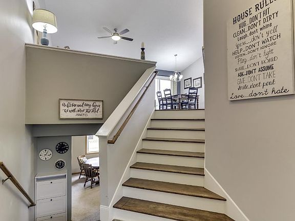 HUGE foyer with wood treads and risers