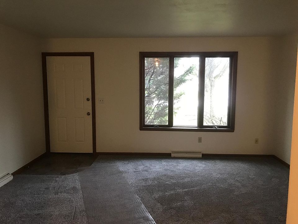 Walk into the front door to the living room. New carpet, blind and paint
