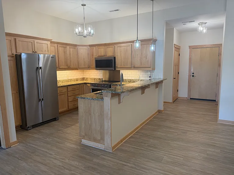 Kitchen with maple cabinets