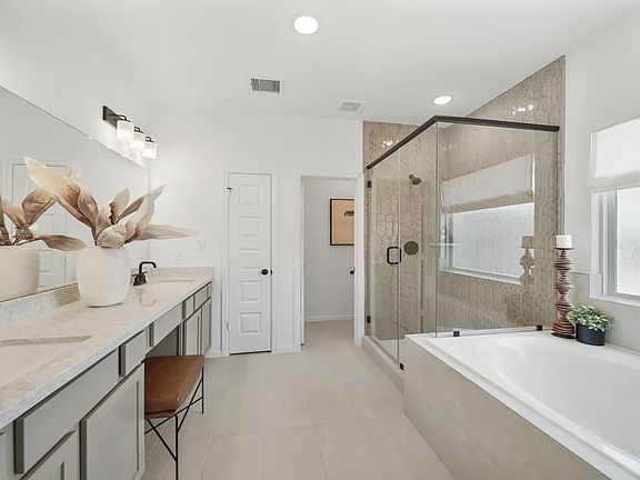 Primary bath with glass shower enclosure