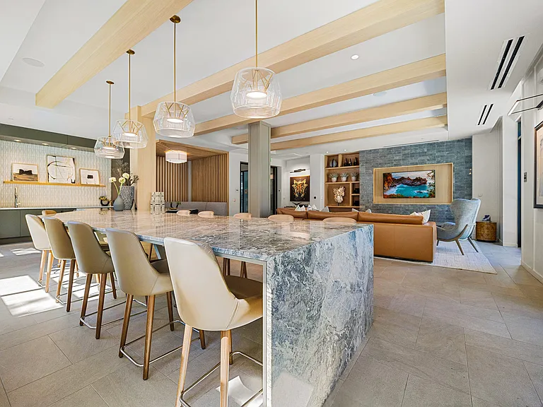 Entertaining space with stone island and lounge seating