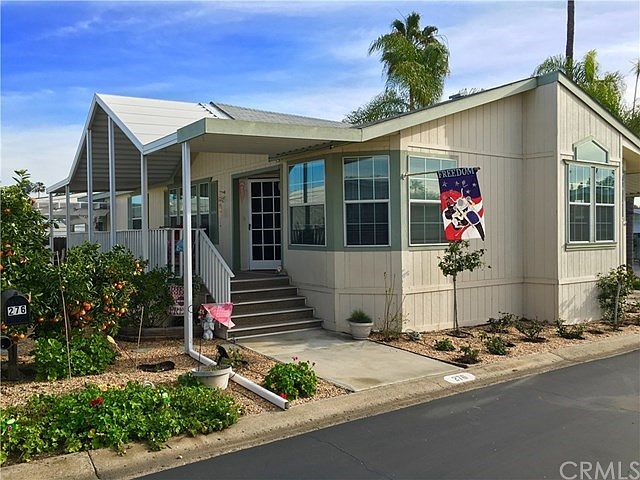 Corner lot location captures sunshine and breezes. Also, delicious tangerines!
