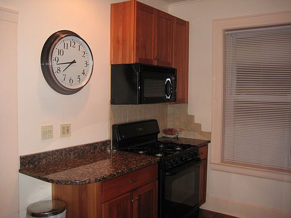 Granite Counter Tops & Eucalyptus Cabinetry