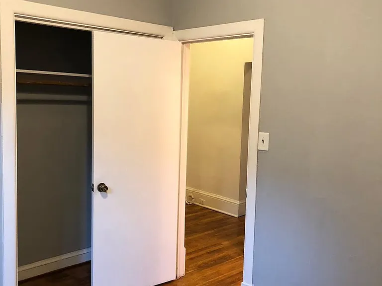 Entry to first bedroom from hallway.