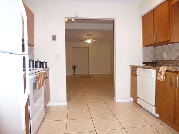 Kitchen looking to living room