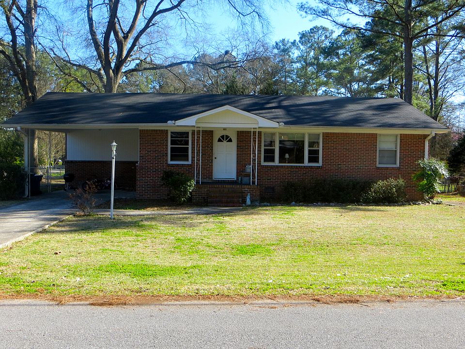 Carport and TWO driveways!