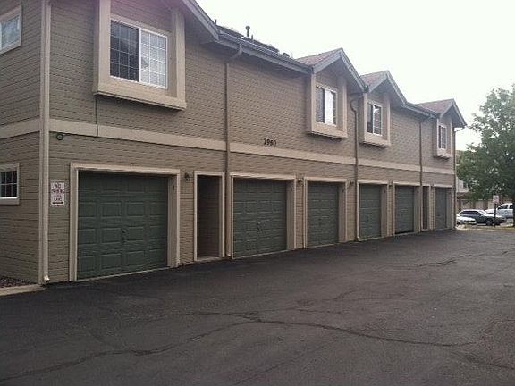 1 car garage with shelving inside