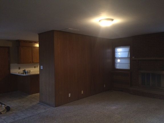 Family with nice woodwork, fireplace